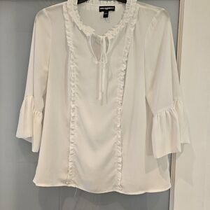 Ruffle accented, tie neck blouse